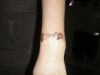 flower band tats on wrist